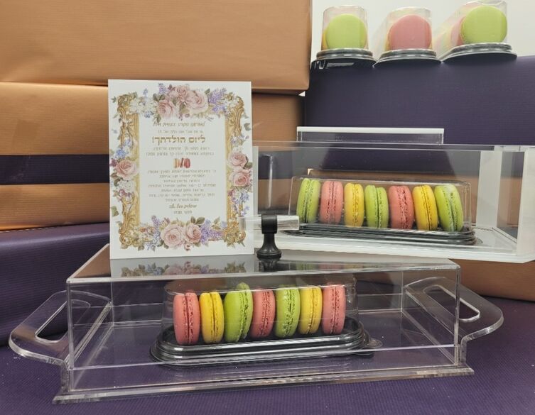 clear acrylic cake holders with macarons inside
