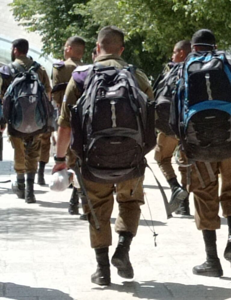 IDF soldiers walking with backpacks