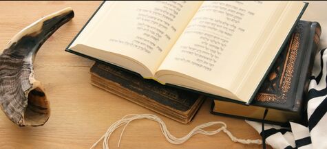 shofar, siddur and tallis on table