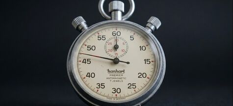 a stopwatch with the sweep second hand between the 45 and 50